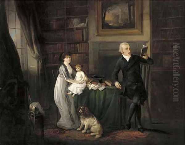 Portrait of a family, seated full-length in a library with their dog - view 1
