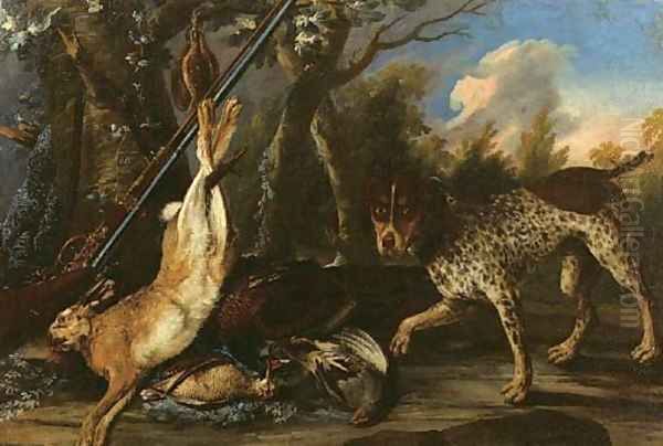 A dead hare and dead snipes hanging from a tree with a pheasant - view 1