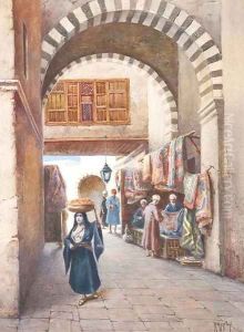 View of a street in a souk with a woman carrying a fruit basket on her head, a carpet stall behind View of a street in a souk with a woman carrying a fruit basket on her head, a carpet stall behind