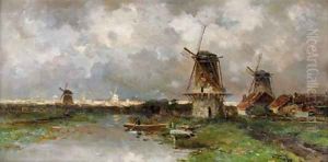 Opkomend onweder windmills along a river