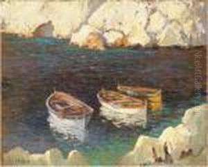 Three Fishing Boats Moored In A Rocky Alcove Three Fishing Boats Moored In A Rocky Alcove