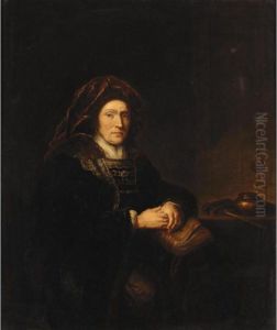 Interior With An Elderly Lady
Seated Beside A Table Holding A Book And A Pair Of Pince-nez by Harmenszoon van Rijn Rembrandt