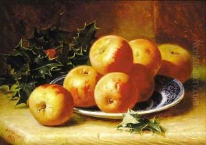 Apples on a willow pattern plate with holly