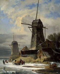 Winter Landscape with a moulin by Andreas Schelfhout