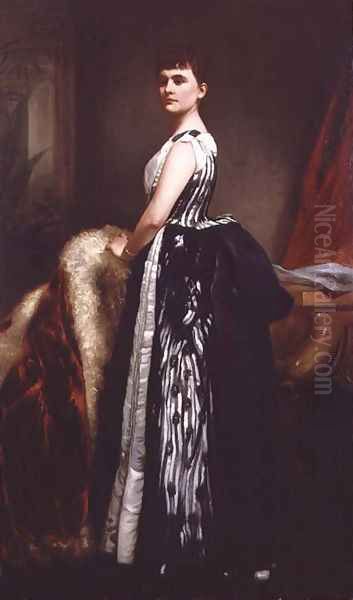 Portrait of a young woman wearing a striped dress and standing in an interior - view 1