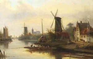 A riverlandscape with a windmill