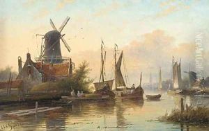 Barges in a calm on a Dutch river estuary