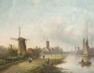 Summer windmills along a river