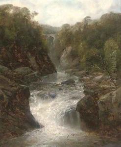 A waterfall in a narrow valley, a bridge beyond