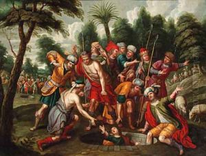 Joseph lowered into the well by his brothers Joseph lowered into the well by his brothers