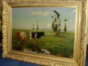 Cattle In A Water Meadow At Sunrise