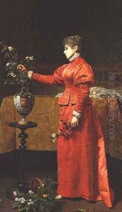 Woman arranging a vase of flowers by Alfonso Savini