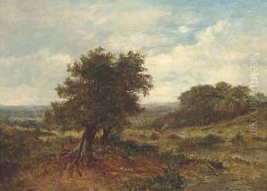 A distant figure in an extensive landscape with a tree in the foreground by English School