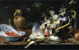 A Still Life Of A Basket Of 
Grapes, Birds, Including A Partridge, Snipe, Sparrow And Finch, Two 
Blue-and-white