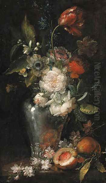 Red and white roses, tulips, anenomes, blossom and other flowers in a glass vase with peaches on a table - view 1