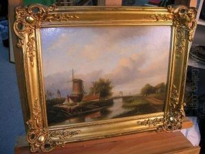A Windmill By A River