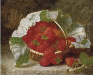 Strawberries And Cabbage Leaf In A Wicker Basket