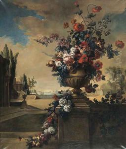 Flowers in a sculpted vase in a landscape