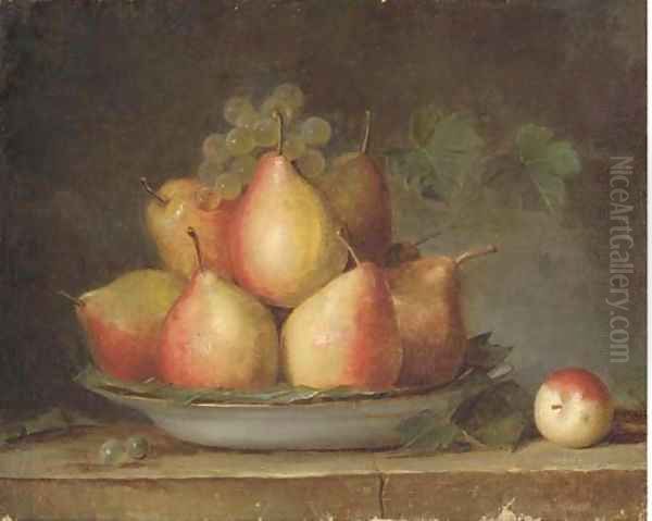 Pears and grapes on the vine in a dish on a ledge - view 1