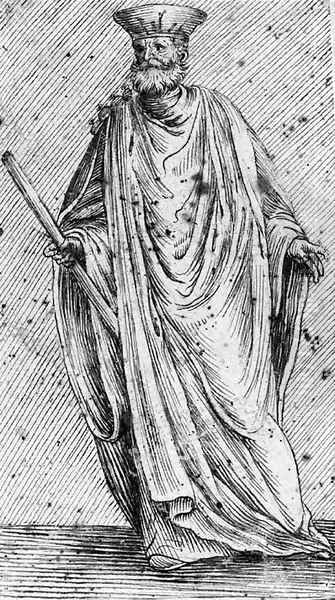 A draped figure holding a stick - view 1