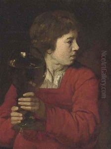 A young boy holding a giant roemer of wine