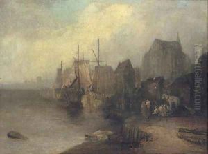 Fishing vessels moored off a coastal town