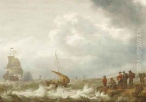 Shipping off the coast in a stiff breeze, figures on the shoreline in the foreground by Cornelis Stooter