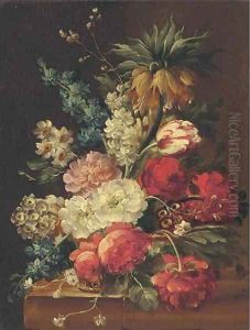Flowers in a bowl on a stone ledge