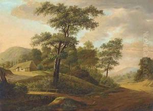 An extensive wooded river landscape with a town beyond by German School