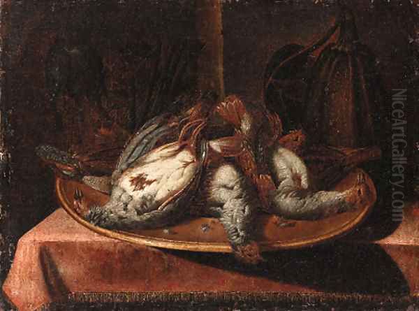 Birds on a gold plate resting on a draped table - view 1