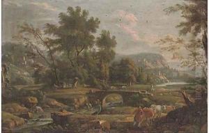 A river landscape with a drover and his cattle, a bridge and town beyond