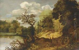 A wooded landscape with travellers on a track by a lake by Flemish School