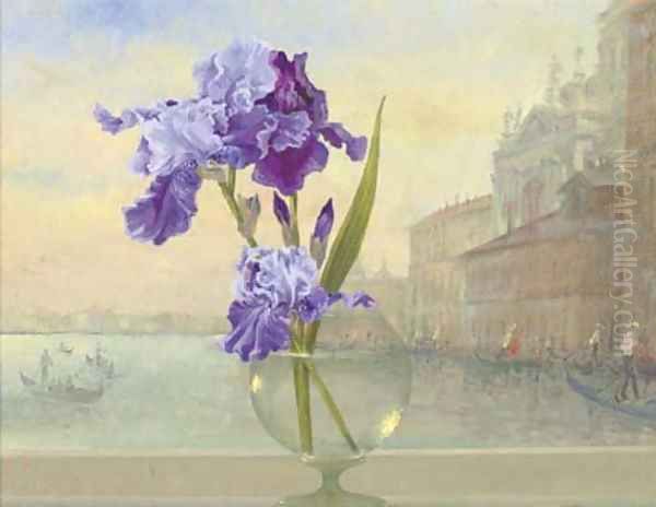 Irises in a glass vase with Venice beyond - view 1