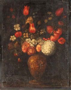 Tulips, roses and other flowers in an ornamental vase