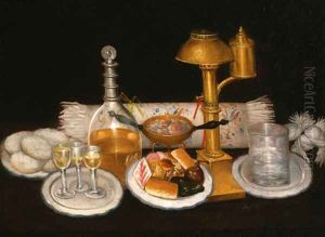 A decanter, wine glasses, a plate of sweetmeats