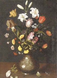 Lilies, tulips, an iris and other flowers in a porcelain vase on a ledge by Spanish School
