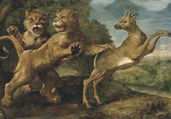 Two lions attacking a stag - view 1