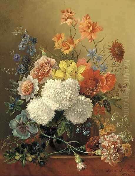 Mixed summer flowers in a glass vase on a ledge - view 1