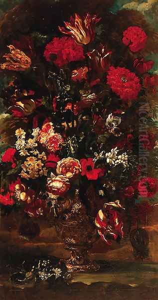 Flowers in a sculpted urn in a landscape - view 1