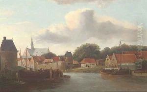 A Dutch river town with barges by Cornelis Springer