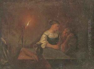 A couple drinking in an interior by candlelight