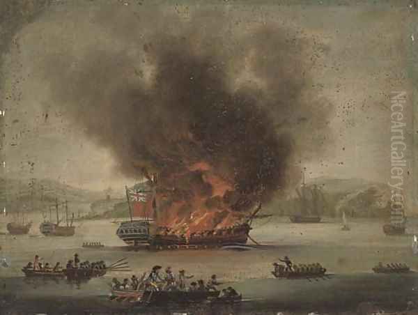A frigate ablaze offshore - view 1