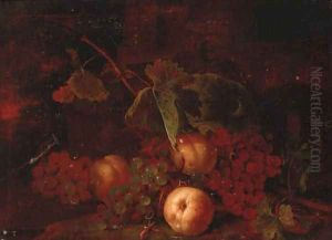 Grapes, peaches with vine leaves on a bank