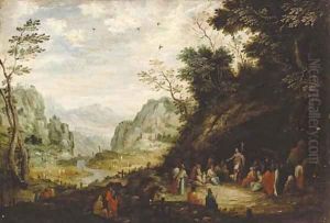 Saint John the Baptist preaching to the multitude in a mountainous landscape