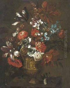 Parrot tulips, chrysanthemums, morning glory, narcissi and other flowers in an urn on a ledge