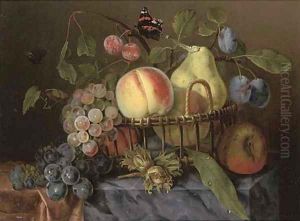 A pear, peaches, plums and grapes in a wicker basket