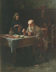 A Gentleman Seated At A Table Tying Flies