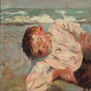 A Boy Resting On The Beach