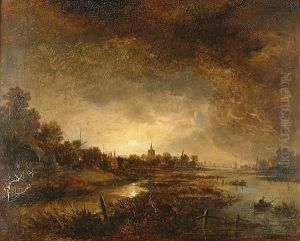 A Riverside Village At Sunset