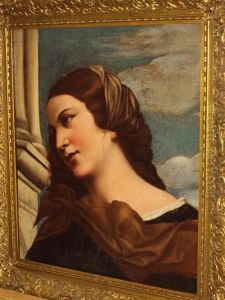 Study Of A Young Lady, Possibly A Detail From An Altar Piece by Tiziano Vecellio (Titian)